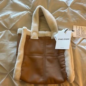 Shearling & faux leather bag